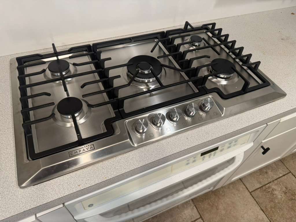 Stainless Empava gas cooktop installed in a Fullerton kitchen