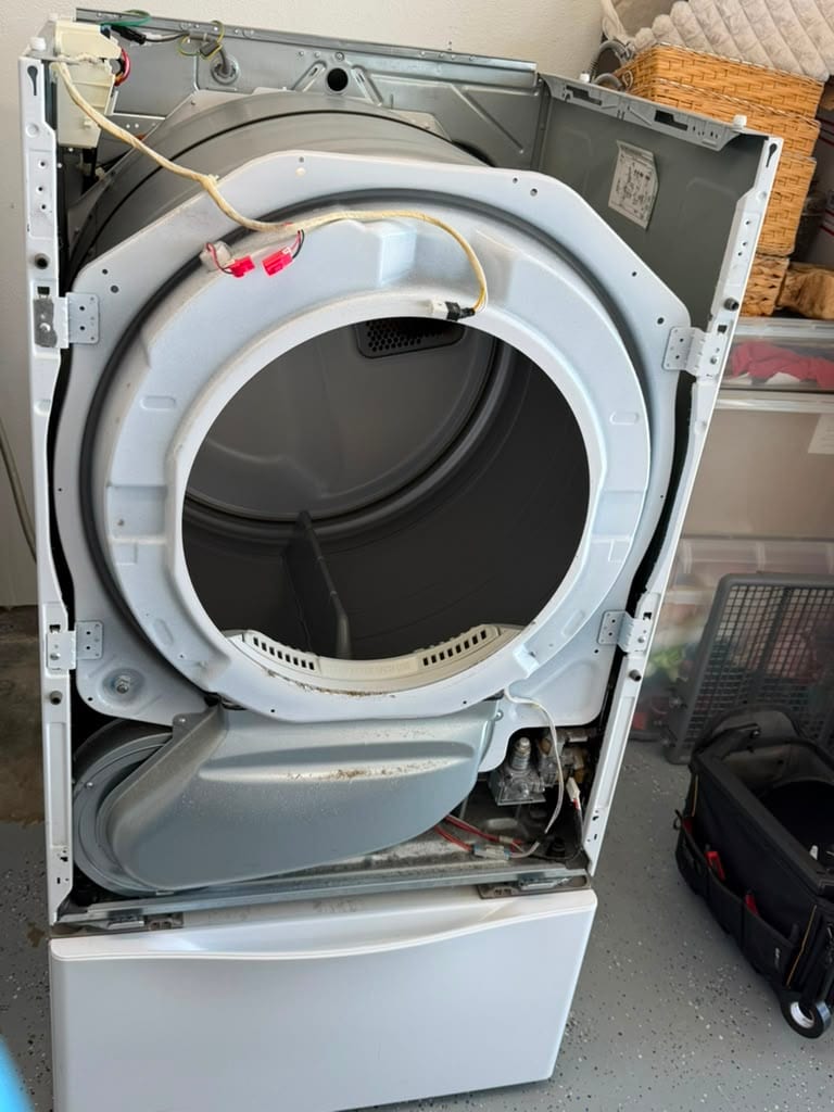 LG front-load dryer opened up on site in Santa Ana to diagnose a no-heat fault
