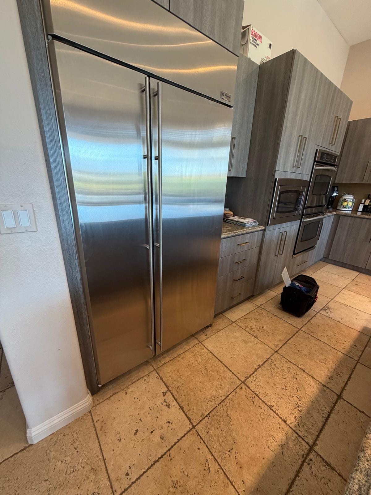 Stainless GE Monogram refrigerator documented for a condenser motor replacement in Mission Viejo