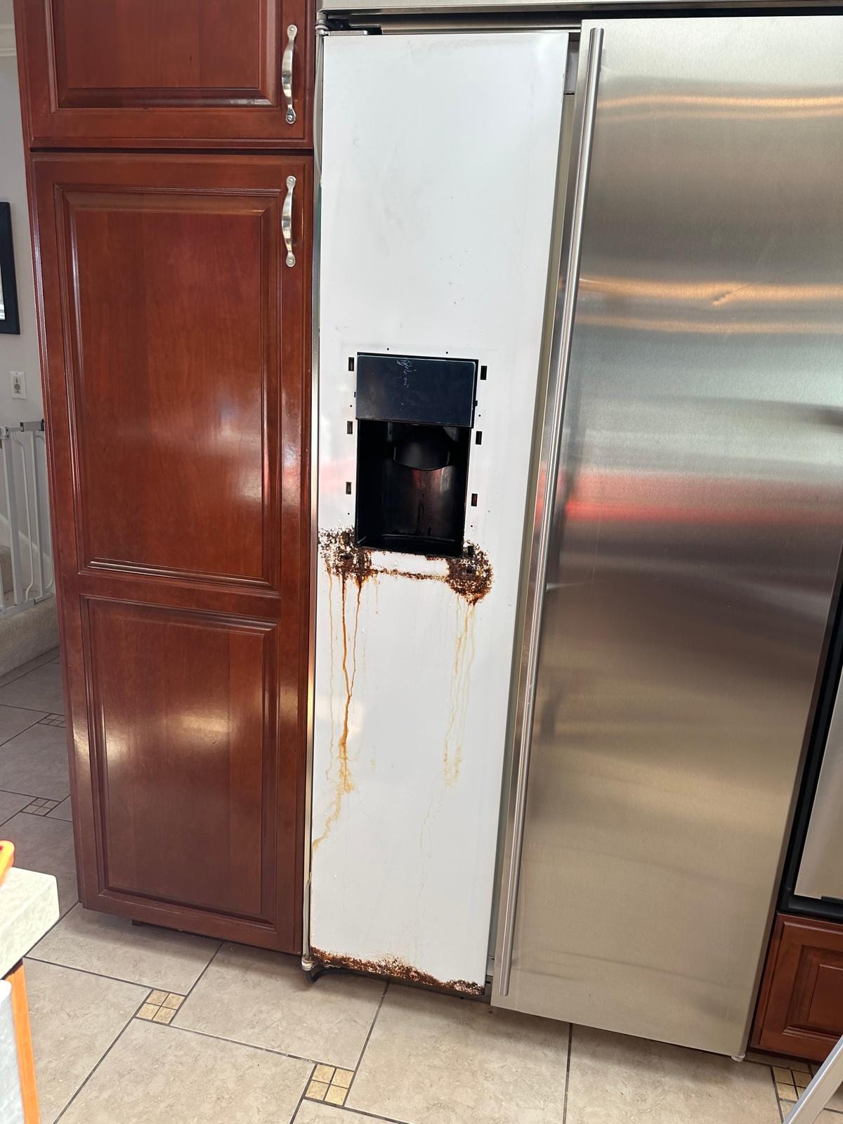GE Monogram refrigerator with the display area open during a display board replacement in Huntington Beach