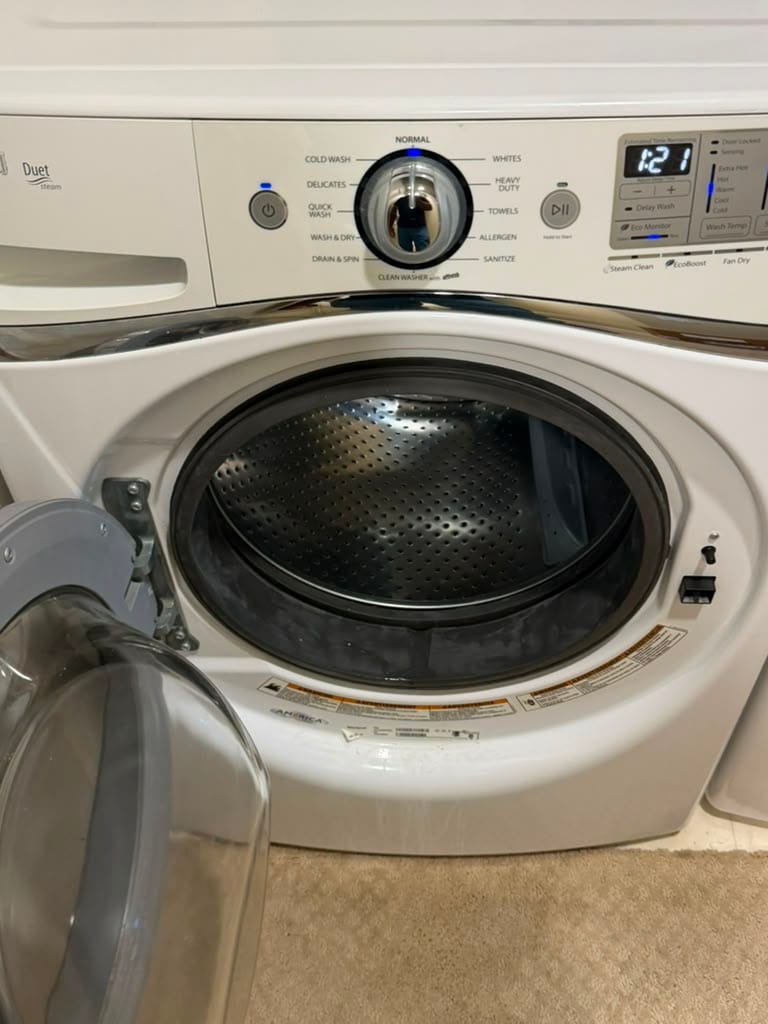White Whirlpool Duet washer with the door open showing the new door boot gasket installed and the machine ready to test in Aliso Viejo