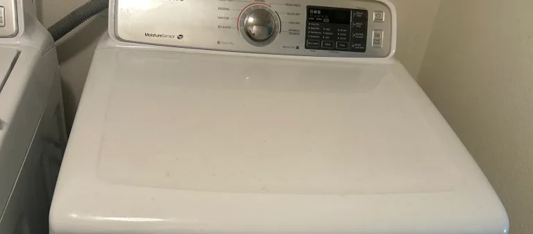 Photo from Kathleen Street's review showing the top-load dryer we repaired