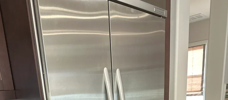 Photo from Henry Lo's review showing the built-in KitchenAid refrigerator we repaired in Brea