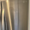 Photo from Steph WW's review showing the LG refrigerator that was repaired