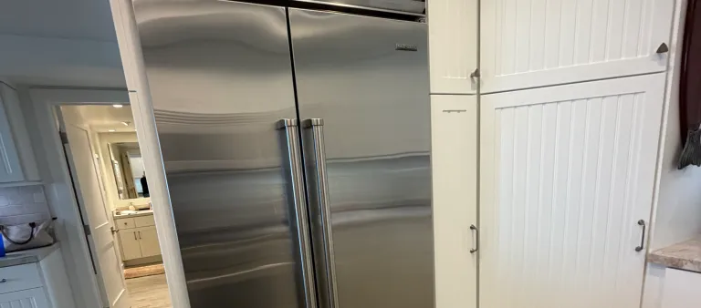 Photo from Tog Valizada's review showing the built-in Sub-Zero refrigerator we repaired